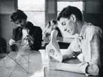 Foundation Design - students at desk with work, yearbook 1957 by Experimental and Foundation Studies Division