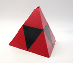 Red and Black Plastic Tetrahedron/Octahedron Glued together to Form Large Tetrahedron by Fleet Library